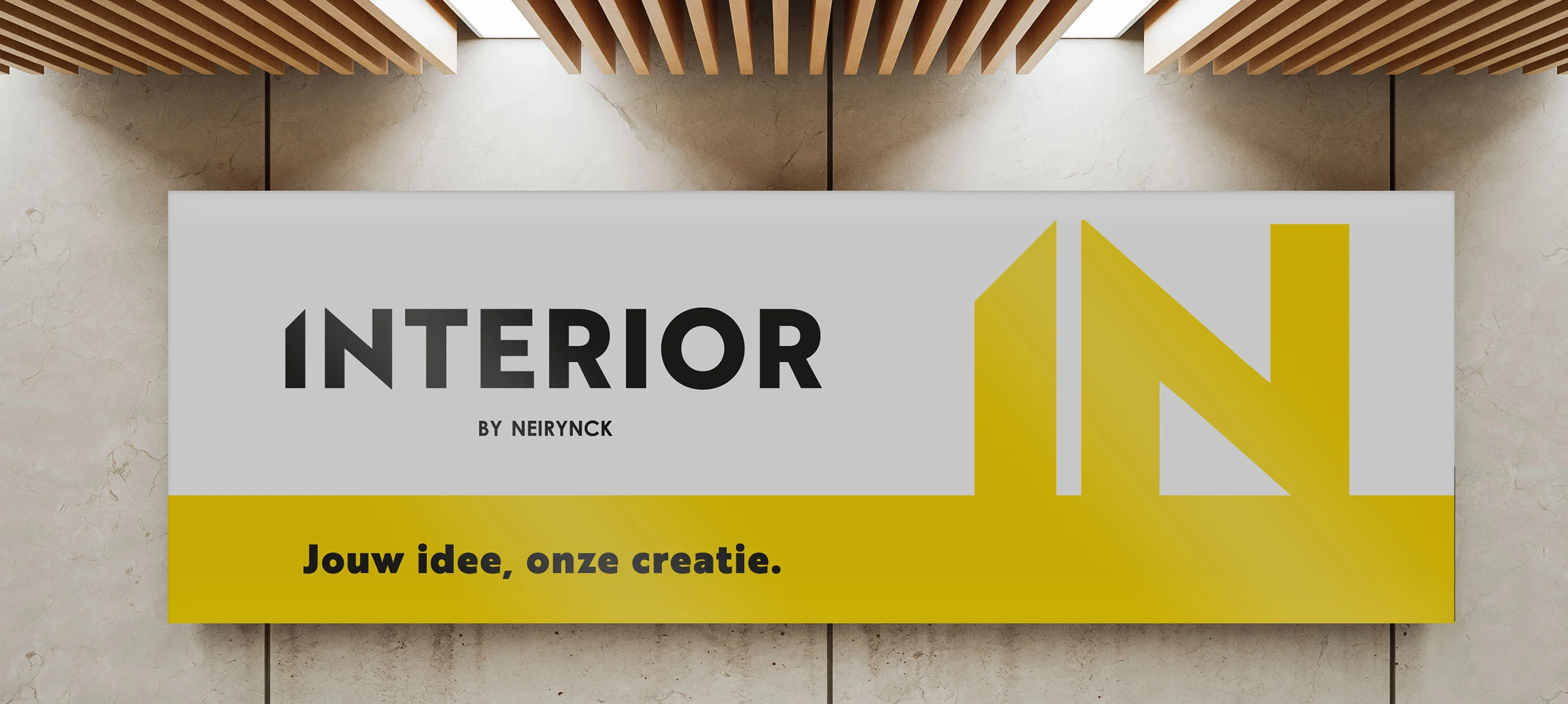 Wandbord met het logo en de slogan van Interior by Neirynck